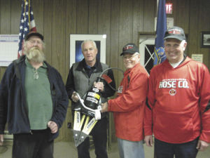 (left to right) town supervisor Stephen Walker, Hose #1 president Greg Thorp, Hose #1 first assistant chief Garry Tompkins and Hose #1 fire chief Michael Scarey.  Photo Credit: Windham Journal